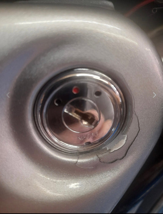 How do I find my Honda motorcycle key code?